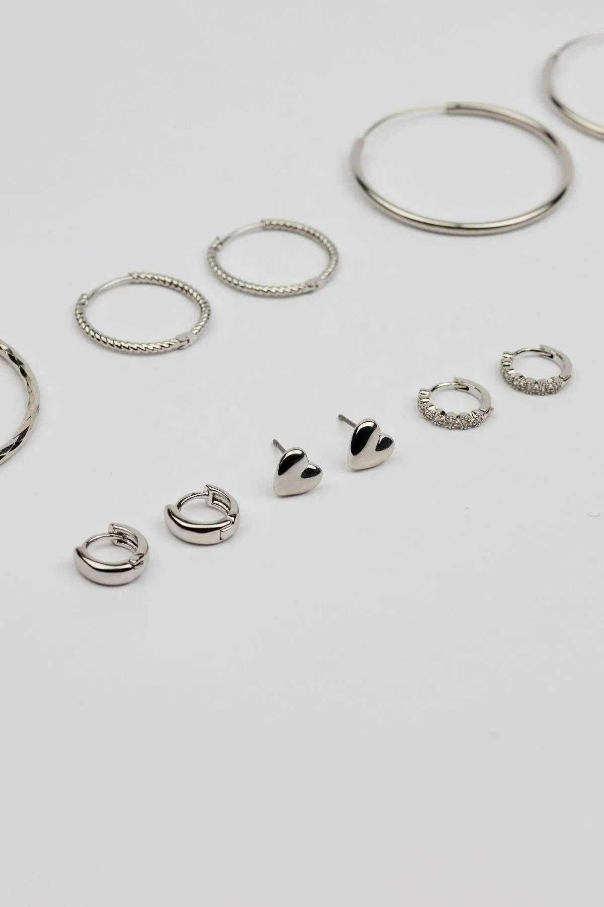 6 Pack of Mini Studs & Thin Hoop Earrings sold by Garage product image thumbnail 4