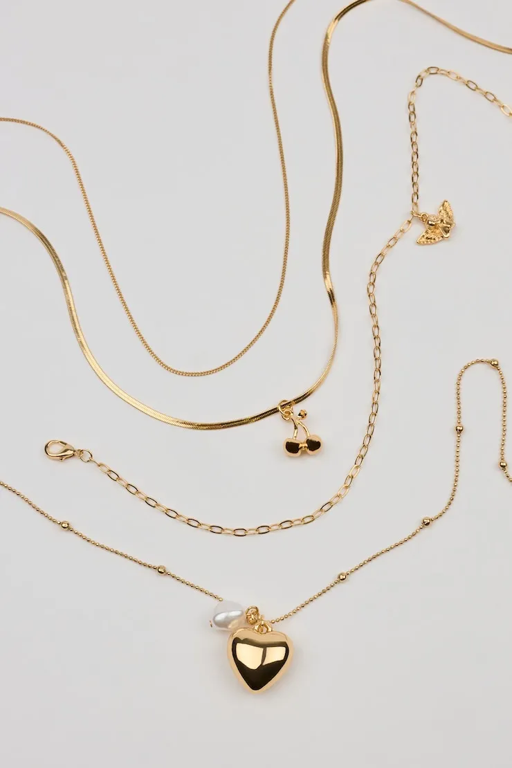 Set of 4 Angel and Cherry Pendant Necklaces - Garage - Yellow - Women Clothing sold by Garage
