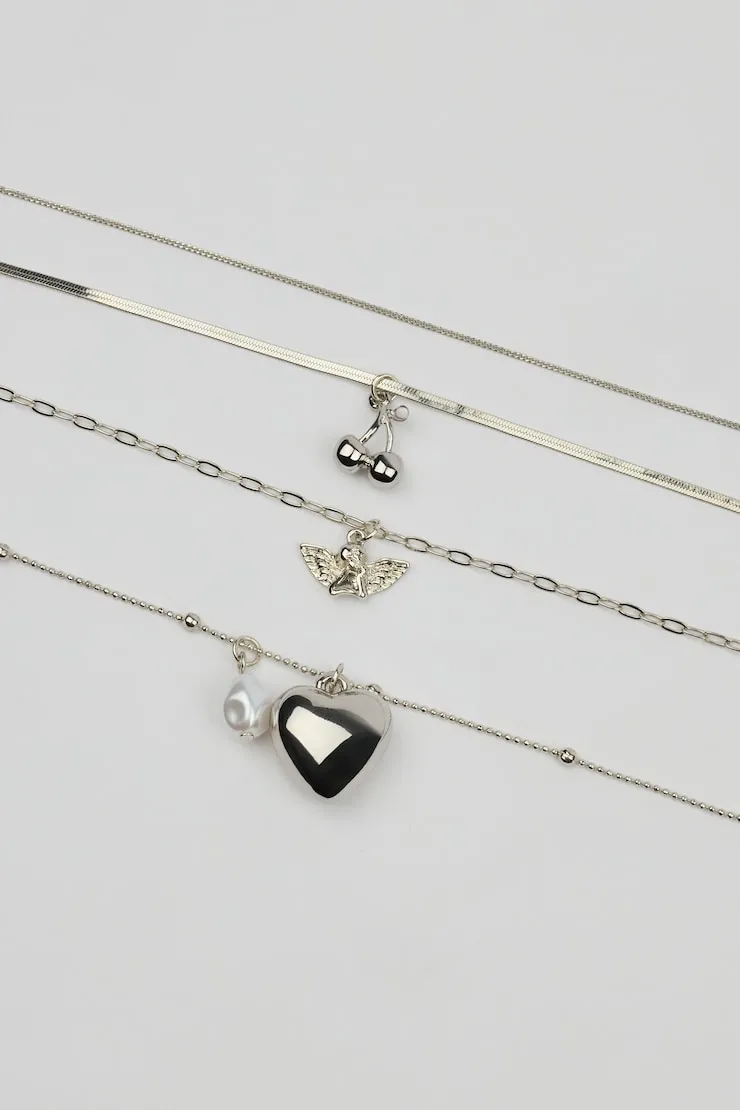 Set of 4 Angel and Cherry Pendant Necklaces - Garage - Grey - Women Clothing sold by Garage