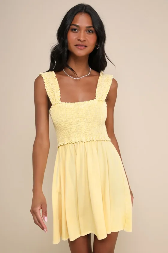 Effortlessly Lovely Washed Light Yellow Smocked Mini Dress sold by Lulus