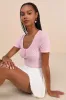 Cutest Example Light Pink Pointelle Knit Short Sleeve Henley Top sold by Lulus