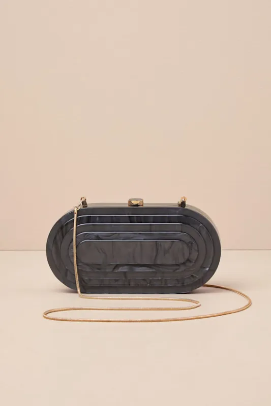 Dyanna Black Marbled Acrylic Oval Clutch sold by Lulus