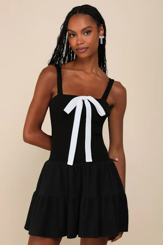 Flirty Edge Black Ribbed Bow Tiered Mini Dress sold by Lulus