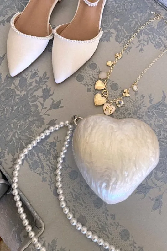 Corvana White Marbled Heart Hard Case Clutch made by Lulus
