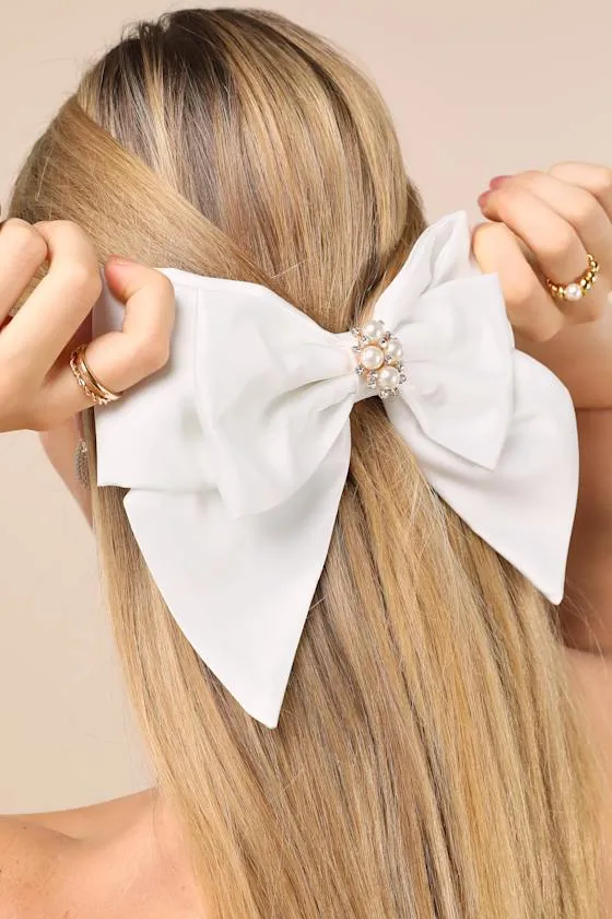 Simply Angelic Ivory Satin Bow Hair Clip sold by Lulus
