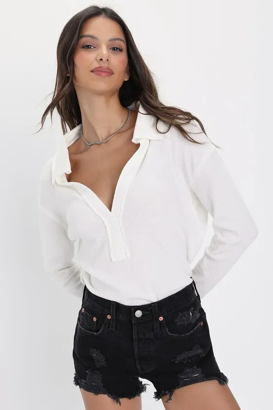 501 Original High-Rise Black Distressed Denim Shorts sold by Lulus