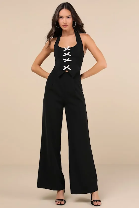 Trendy Perspective Black Bow Cutout Halter Jumpsuit sold by Lulus