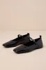 Delia Black Leather Buckle Ballet Flats sold by Lulus