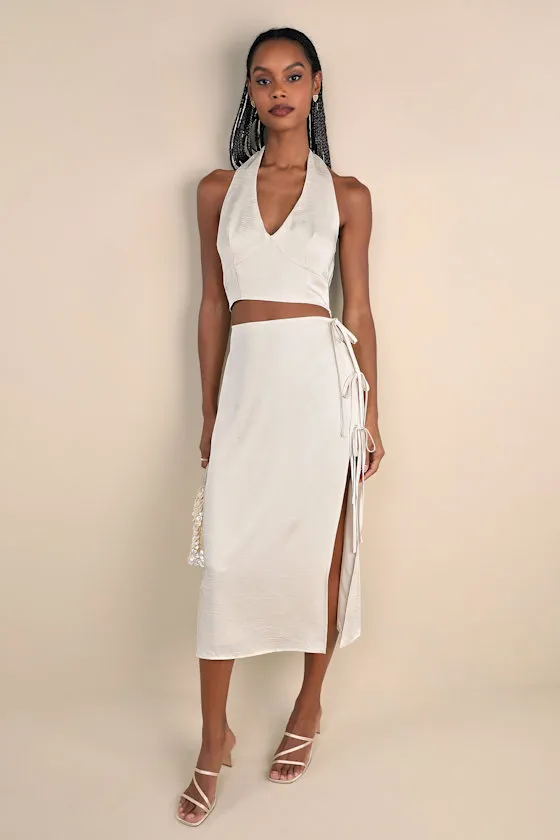 Marvelously Sleek Champagne Satin Crinkled Side-Tie Midi Skirt sold by Lulus