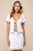 Preppy Tendencies Ivory Ribbed Knit Ruffled Mini Sweater Skirt sold by Lulus