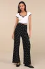 Marvelously Adorable Black Polka Dot Pleated High-Rise Pants sold by Lulus
