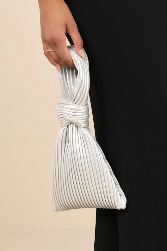 Carey Silver Pleated Knotted Handbag sold by Lulus