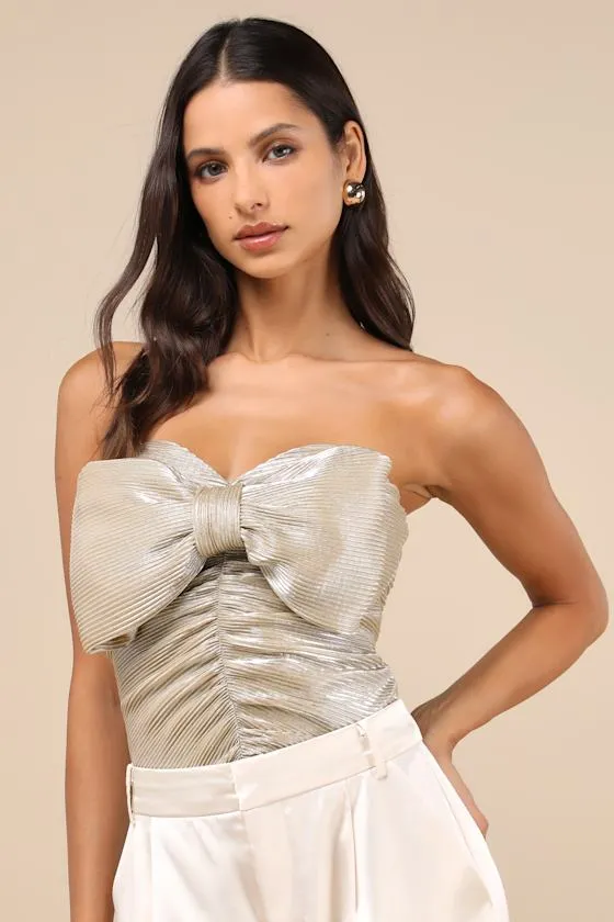 Fashionista Flair Shiny Champagne Bow Strapless Top sold by Lulus