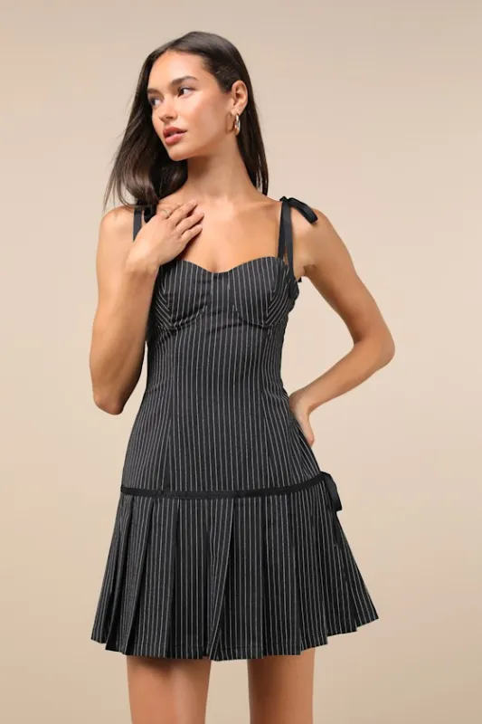Posh Flirtation Black Pinstriped Tie-Strap Drop-Waist Mini Dress sold by Lulus
