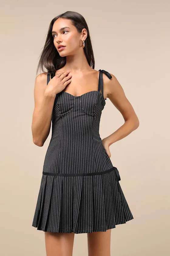 Posh Flirtation Black Pinstriped Tie-Strap Drop-Waist Mini Dress sold by Lulus