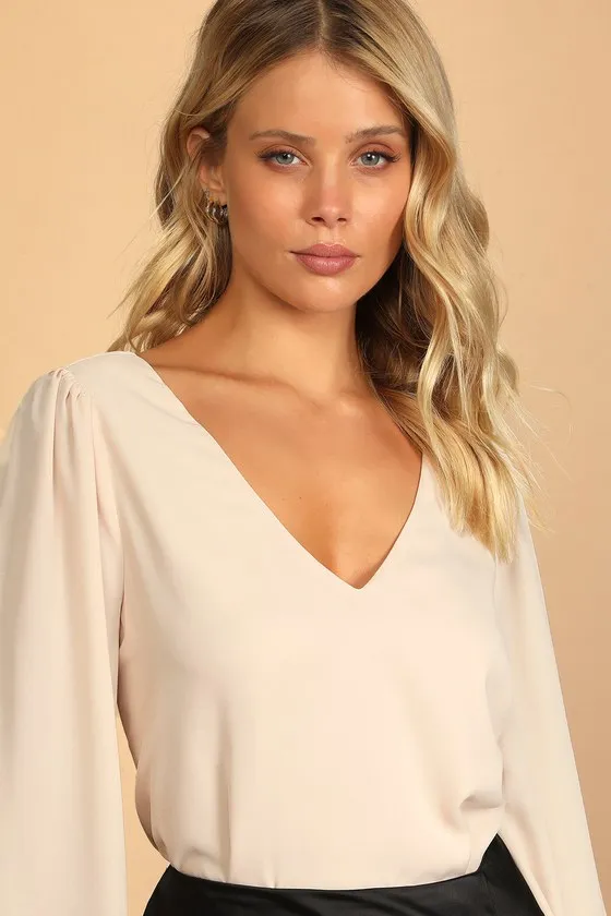 Stylish and Sincere Beige Long Sleeve V-Neck Top sold by Lulus