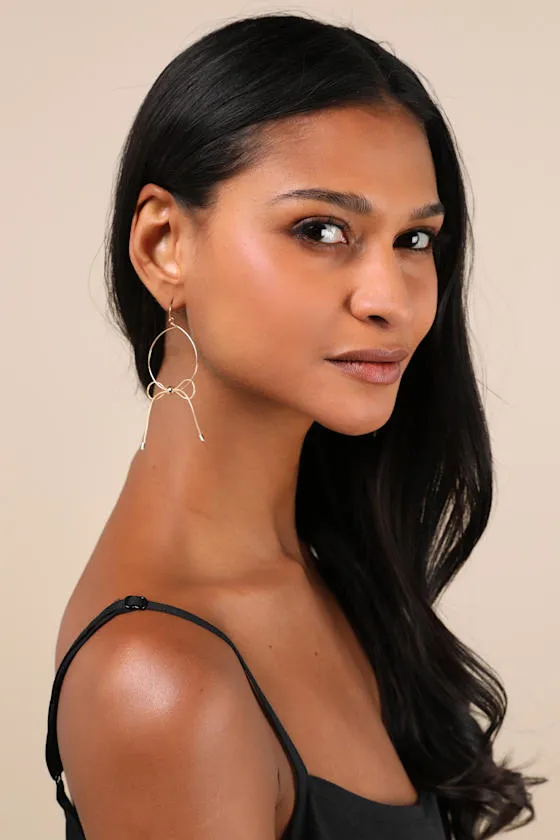 Dainty Indulgence Gold Bow Hoop Earrings sold by Lulus product image thumbnail 2