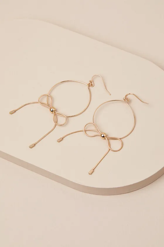 Dainty Indulgence Gold Bow Hoop Earrings sold by Lulus product image thumbnail 3