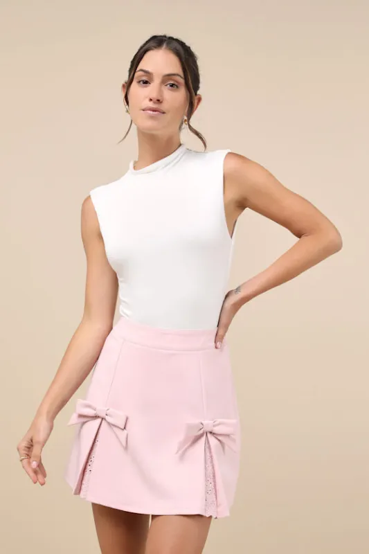 Charmed Energy Light Pink Embroidered Pleated Bow Mini Skirt sold by Lulus