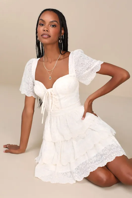 Inclined to Charm Ivory Embroidered Tiered Lace-Up Mini Dress sold by Lulus