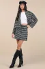 Ada Black and White Houndstooth Mini Skirt sold by Lulus