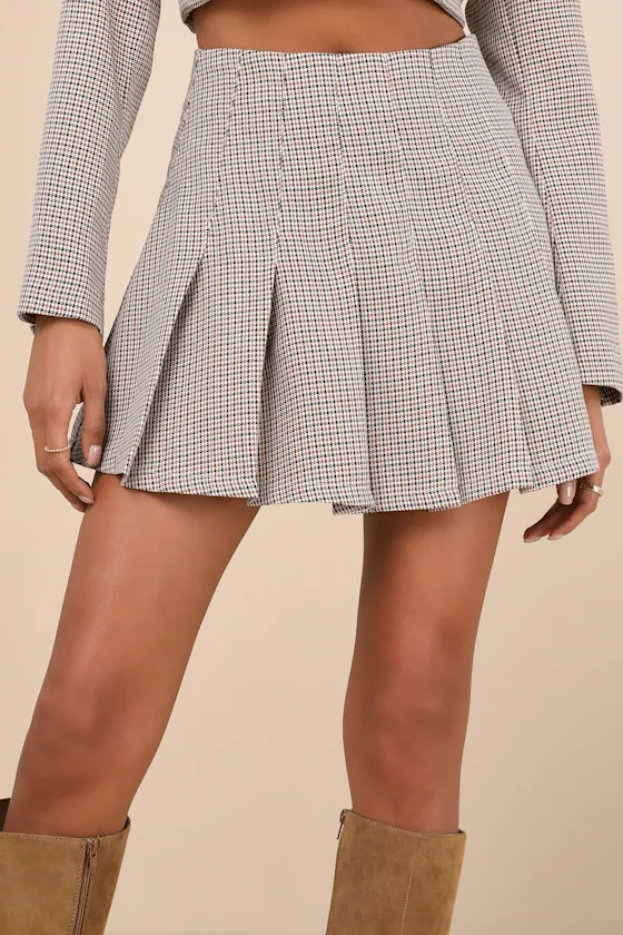Convincingly Poised Brown Plaid Pleated Mini Skirt sold by Lulus
