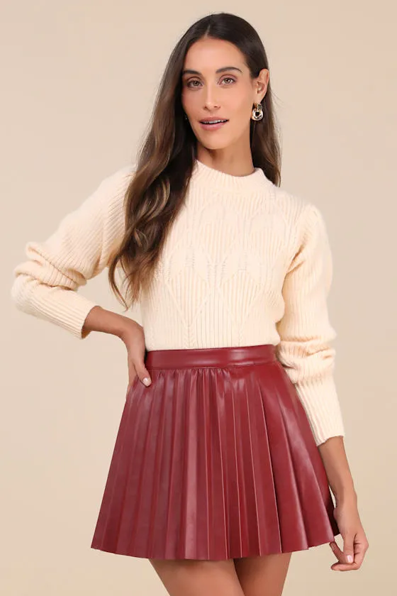 Chic Edge Burgundy Vegan Leather Pleated High-Rise Mini Skirt sold by Lulus