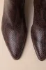 Nonah Java Snake-Embossed Pointed-Toe Ankle Boots sold by Lulus