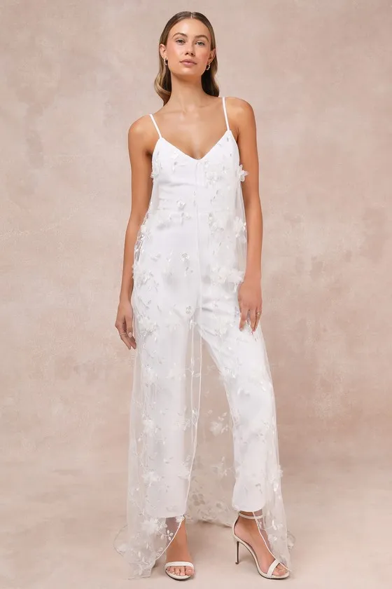 Extreme Elegance White Mesh Floral Embroidered Cape Jumpsuit sold by Lulus
