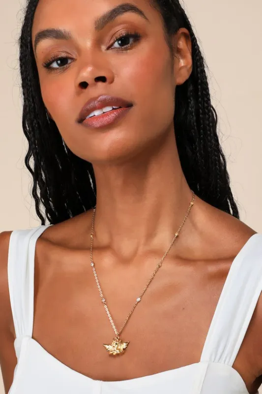 Box of Rain Gold Rhinestone Cherub Pendant Necklace sold by Lulus