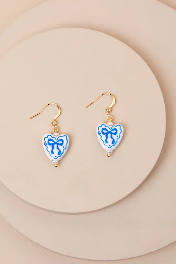 Set for Santorini White Heart Drop Earrings sold by Lulus