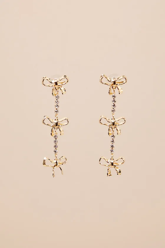 Delightful Glimmer Gold Bow Drop Earrings sold by Lulus product image thumbnail 4