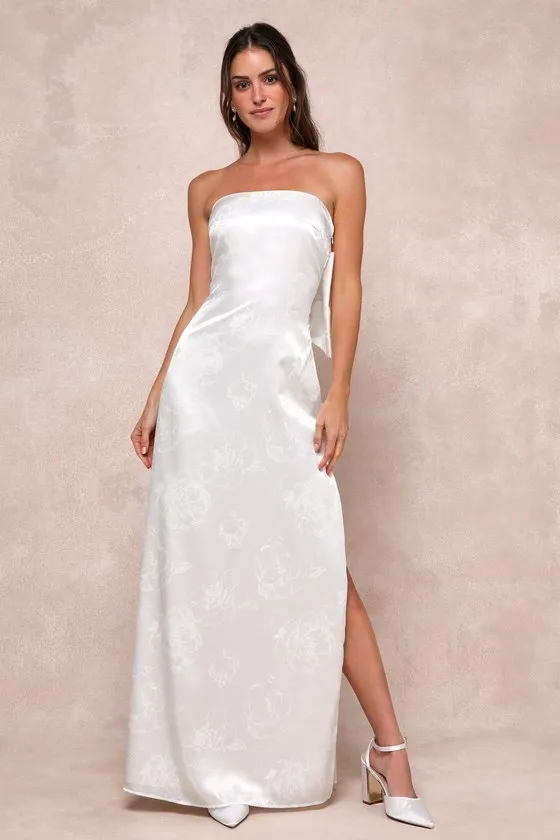 Avid Elegance Ivory Satin Jacquard Strapless Bow Maxi Dress sold by Lulus