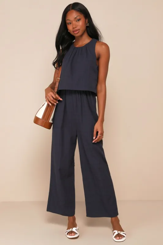 Breezy Sophistication Navy Blue Textured Wide-Leg Jumpsuit sold by Lulus