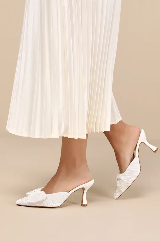 Bettanie White Satin Textured Bow High Heel Mules sold by Lulus