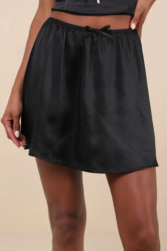 Delicate Aesthetic Black Satin Bow Mini Skirt sold by Lulus product image thumbnail 3