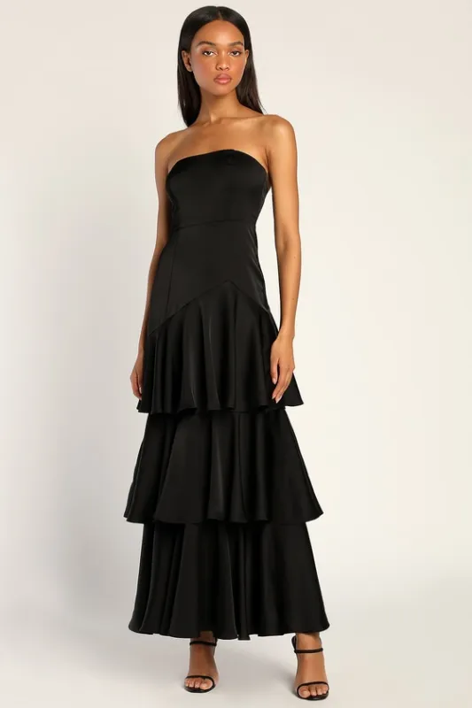 Blissfully Beautiful Black Satin Strapless Tiered Maxi Dress sold by Lulus