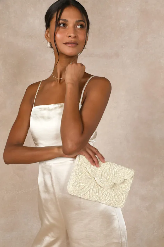 Stunning Addition White Beaded Clutch sold by Lulus
