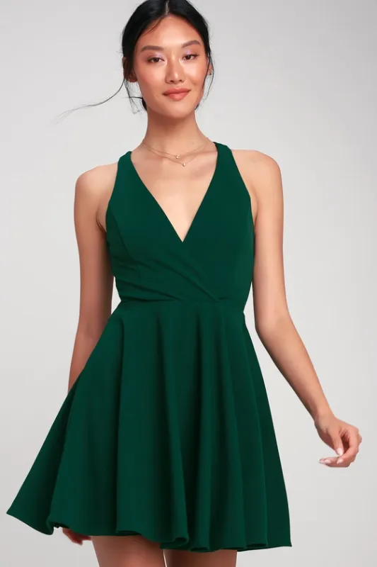 Wonder Whirl Dark Green Twist Back Skater Dress sold by Lulus