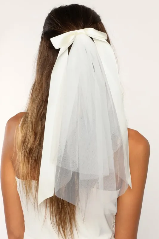 Aisle Style Ivory Satin Bow Hair Clip Mini Veil sold by Lulus