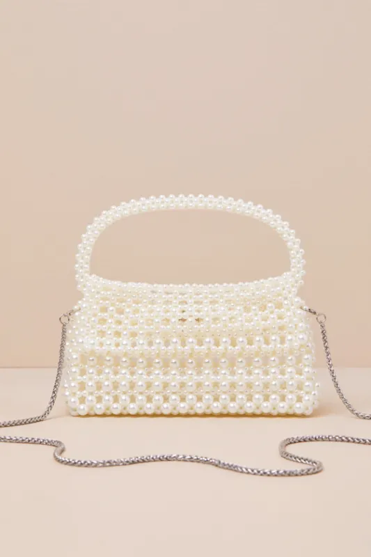 Elloise White Pearl Mini Handbag sold by Lulus