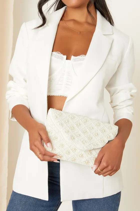 Stolen Your Heart Ivory Beaded Pearl Clutch sold by Lulus