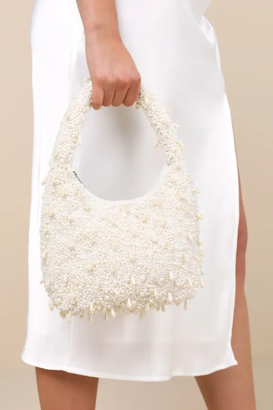 Notorious Glow White Pearl Fringe Handbag made by Lulus