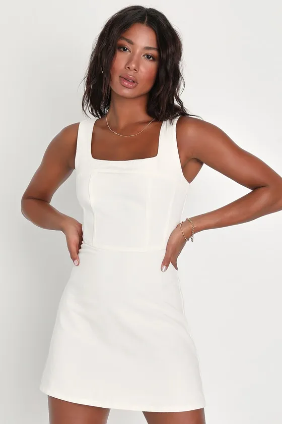 So Delighted Ivory Denim Corset Seam Mini Dress sold by Lulus