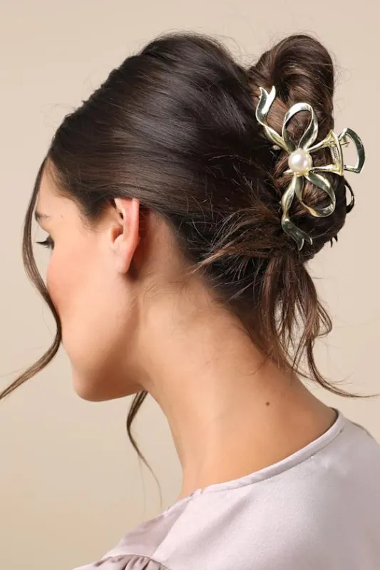Posh Brilliance Gold Pearl Bow Claw Hair Clip sold by Lulus