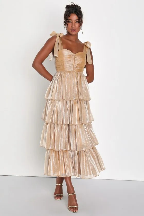 Radiant Arrival Shiny Gold Organza Tiered Tie-Strap Maxi Dress sold by Lulus