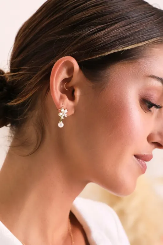 Simply Sparkling Gold Rhinestone Pearl Flower Stud Earrings sold by Lulus