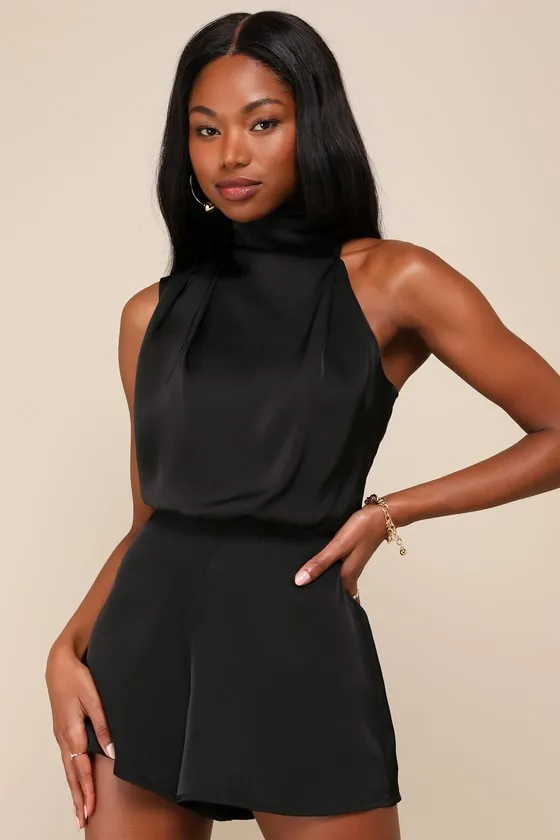 Advantageous Perfection Black Satin Asymmetrical Romper sold by Lulus