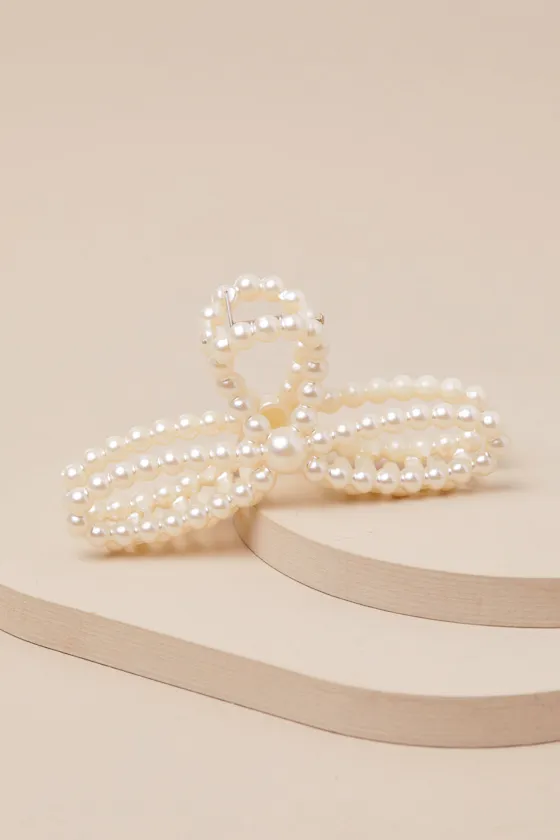 Premium Sweetness Ivory Pearl Bow Claw Hair Clip sold by Lulus