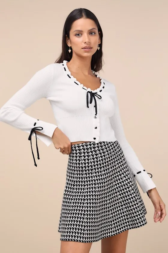 Adorably Flattering Ivory Ribbed Ruffled Bow Sweater Top sold by Lulus